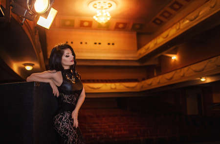 Portrait of beautiful young woman with makeup in fashion clothesの写真素材