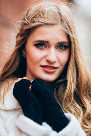 Beautiful girl in autumn garden