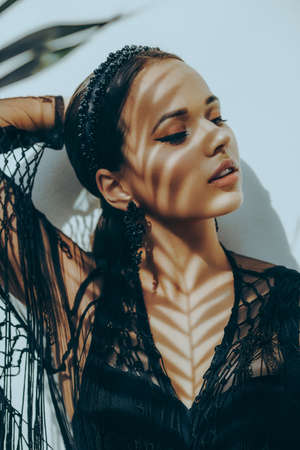 Portrait of beautiful young brunette woman with makeupの写真素材