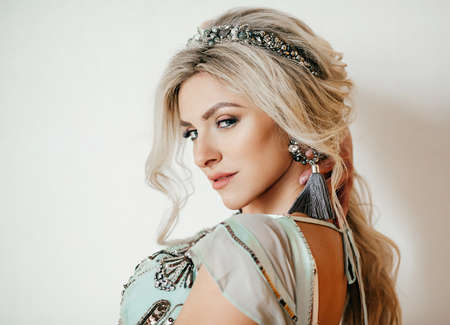 Portrait of beautiful young blonde woman with makeupの写真素材