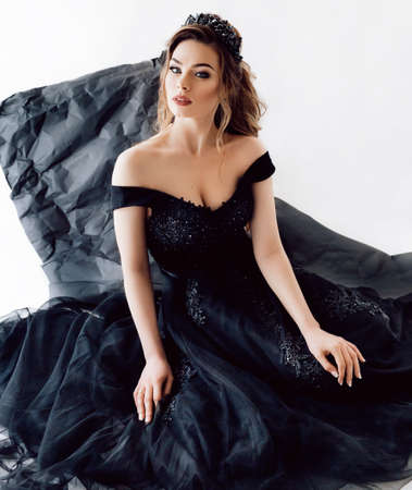 Black dress Portrait of a beautiful woman with makeup in fashion black clothesの写真素材