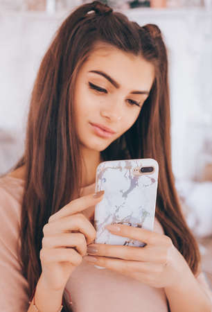 Portrait of a beautiful young brunette in a hand
