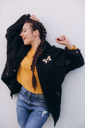 Portrait of beautiful young brunette woman with makeup