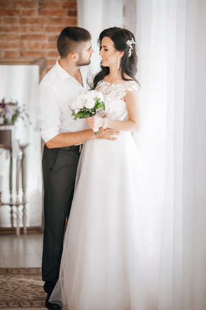 Happy bride and groom on their weddingの写真素材