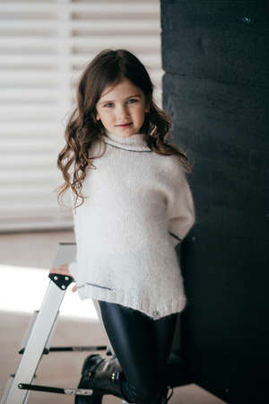 Portrait of beautiful little girl with pigtailsの写真素材