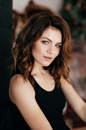 Portrait of beautiful brunette girl with makeup