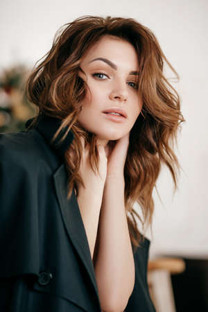 Portrait of beautiful brunette girl with makeup