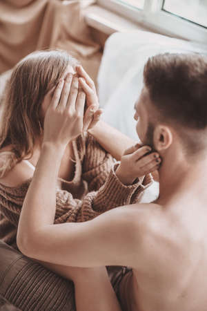 Stock photo - Portrait of happy loving couple at home