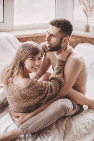 Stock photo - Portrait of happy loving couple at home