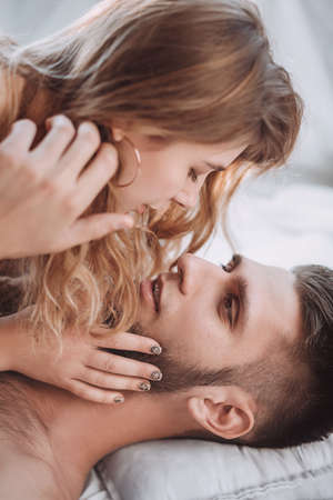 Stock photo - Portrait of happy loving couple at homeの写真素材