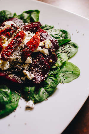 Stock Photo - Tasty vegetable salad with grilled chicken on a white plateの写真素材