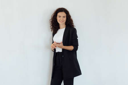 Stock Photo - Young female professional smiling to camera. Professional psychologist