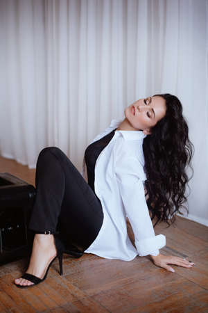 Photo of beautiful young girl in a casual clothesの写真素材