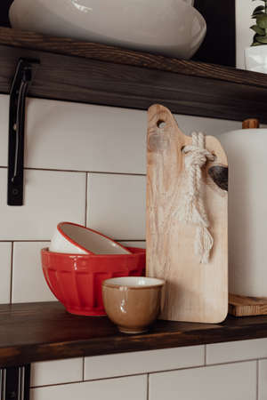 A cute rustic wooden kitchenware in the kitchen. Cozy way to rest, home comfort concept.の写真素材