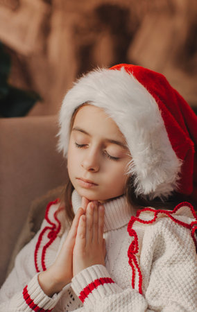 Cup with milk, cookies and gift on a green background. Minimalistic greeting cards and envelopes. Christmas and New Year.の写真素材