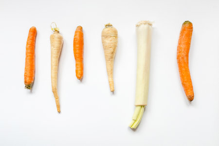 Vegetables set. Celery and carrot on light background. Healthy eating concept. Creative layout with copy space. Flat lay, top view.の写真素材