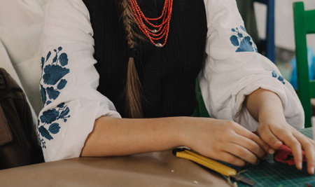 Close-up of hands making a candle from beeswax. Master class on creating a candle. DIY. Part of the series. Soft focusの写真素材