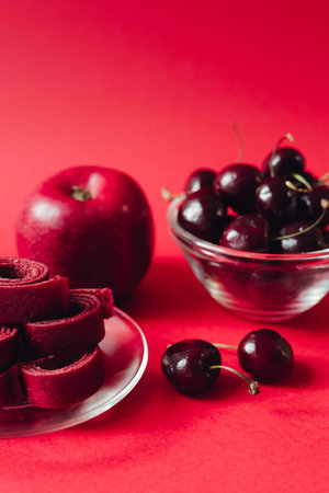 Homemade summer fruit pastille. Sweet vegetarian dessert. Pastille rolls. Fruit leather in slices . Raw food, vegan sweetness, dessert without sugar and flour. For text and articles on healthの写真素材