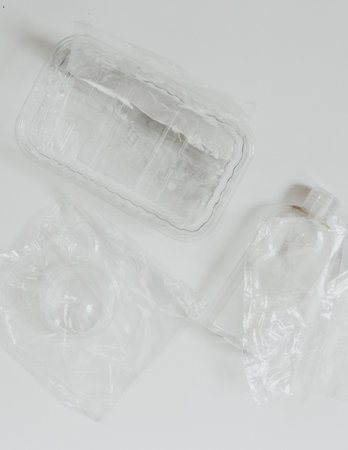 Waste plastic bottles behind in plastic recycling industry. waste management concepts. The concept of waste minimization and consumerism. Top view. Part of a series. Background with place for textの写真素材