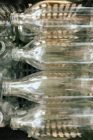 Empty Glass Bottles for Recycling. European urban setting. Close up. Part of the series.の写真素材