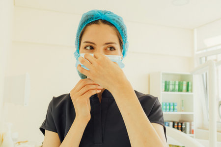Woman in medicine, young dentist professional, teeth and dentist for dental care, appointment or checkup at clinic. Tooth whitening, cleaning or oral, mouth and gum care. Part of a series. Close-upの写真素材