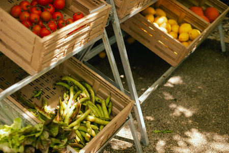 Fresh vegetables at small local urban market. Organic produce on sale at outdoor farmer market....