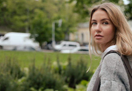 Middle-aged woman recording video on phone camera share via app her travel vacation in the city. Gen Z influencer shooting social media stories on the street. Part of a series. UGCの写真素材