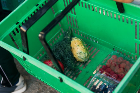 Fresh vegetables at small local urban market. Organic produce on sale at outdoor farmer market....
