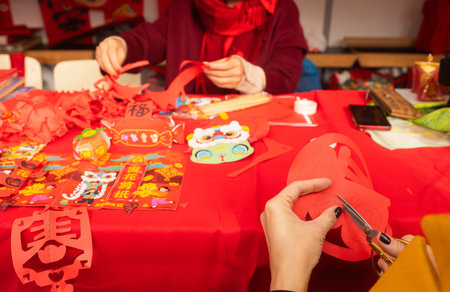 Chinese New Year papercutting workshop - create traditional festive symbols and Chinese characters...