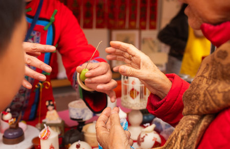 Chinese New Year candle workshop - create traditional festive symbols and Chinese characters from...
