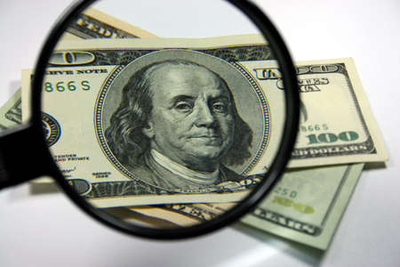 cash with loupeの写真素材