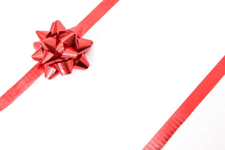 Red bow isolated on white backgroundの写真素材