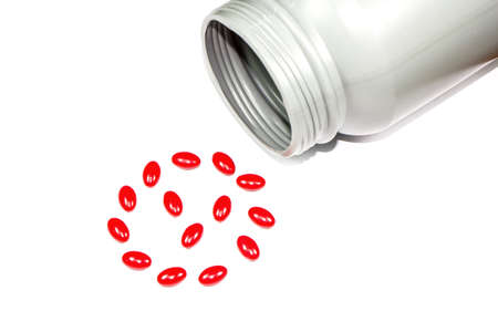 vitamin supplement capsules on white backgroundの写真素材