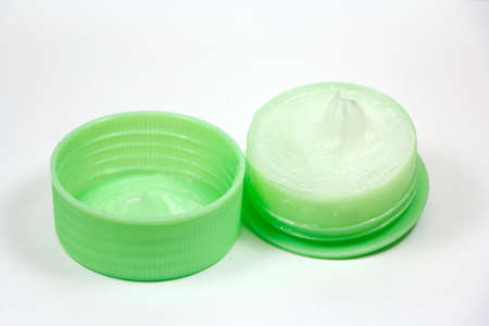Ointment in container isolated on backgroundの写真素材