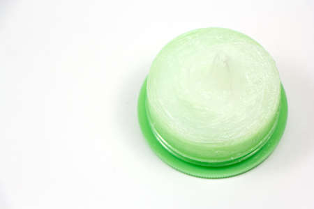 Ointment in container isolated on backgroundの写真素材