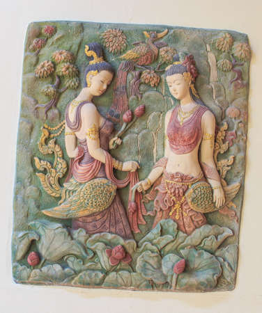 Wall sculpture woman on wallの写真素材