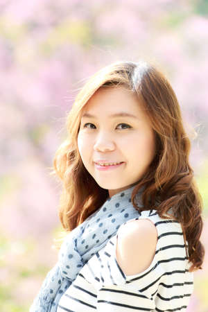Smile asia woman  in park outdoor.の写真素材