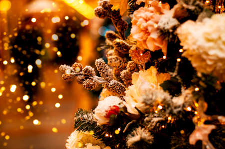 Beautiful decorated Christmas tree with blurred backgroundの写真素材