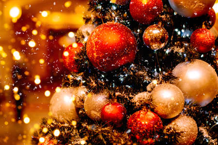 Beautiful decorated Christmas tree with blurred backgroundの写真素材