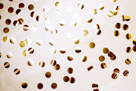 Festive background with golden confetti. Bright new year concept.