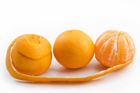 three tasty sweet bright tangerines on whiteの写真素材