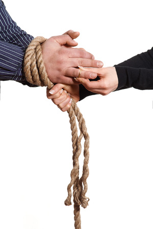 woman trapped her boyfriend with a rope and put the ringの写真素材