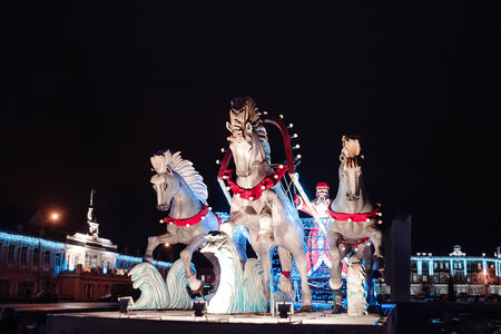 Street decoration to Christmas and New Year holidays  at night. Sculpture of the three horsesの写真素材