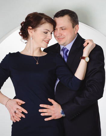 lovely couple smiling and hugging, Studio portraitの写真素材