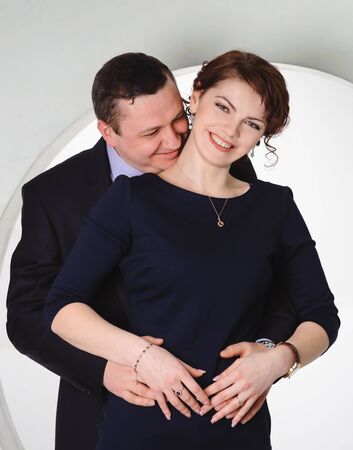 happy couple smiling and hugging, Studio portraitの写真素材