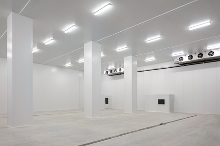 Interior of a big modern clean and empty warehouseの写真素材
