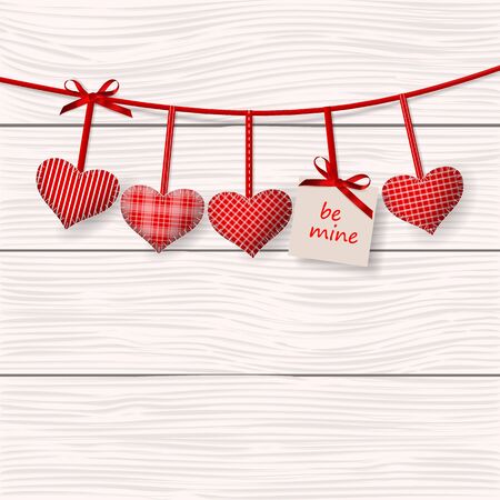 Red hearts hanging over wooden background.のイラスト素材