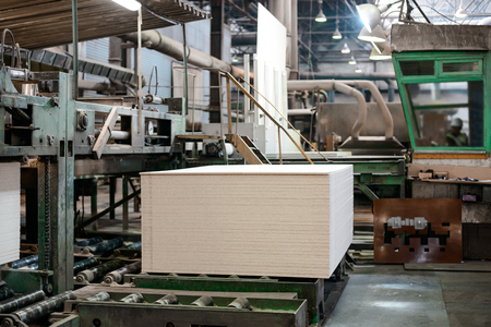 Workshop for the production of particle boards. Manufacture of chipboard, veneer, plywood, wood panels. Wood processing. Woodworking industryの写真素材