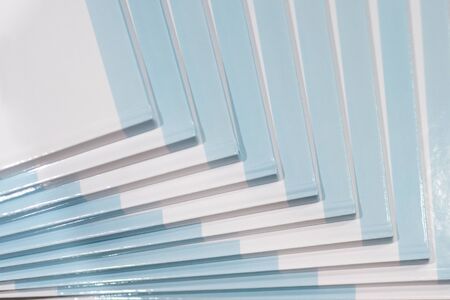 Stack of books with a blue hard cover. Composition from booksの写真素材