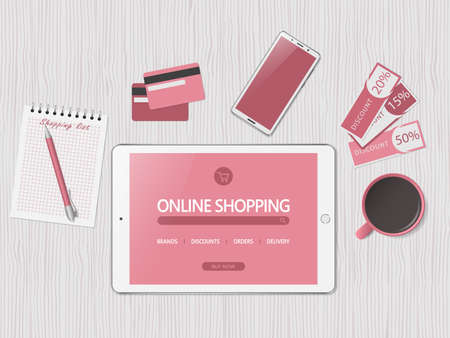 Online shopping concept. Online store website on tablet screen.. Workspace with tablet, credit cards and discount coupons. Top view, flat lay. Vector illustrationのイラスト素材